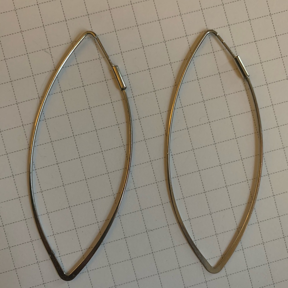 silver leaf shaped hoops from Urban Outfitters